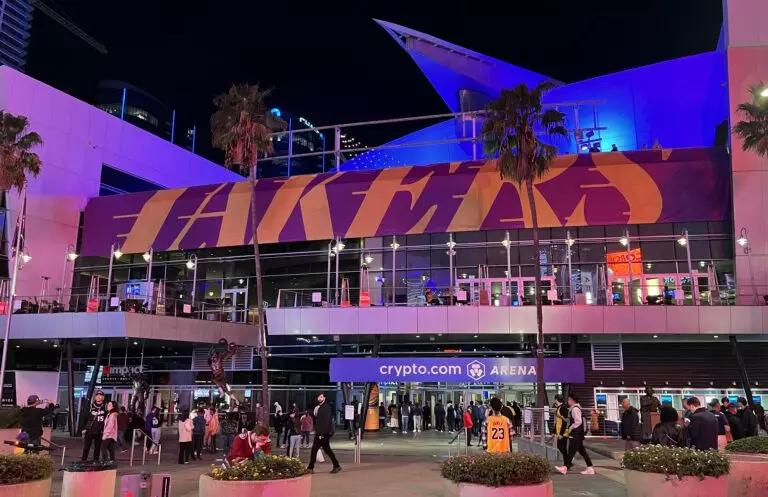 Outside Crypto.com Arena with Lakers logo above the entrance, and the site for Lakers-Nuggets Game 4. Photo by Troutfarm27 - Own work, CC BY-SA 4.0, https://commons.wikimedia.org/w/index.php?curid=125320522